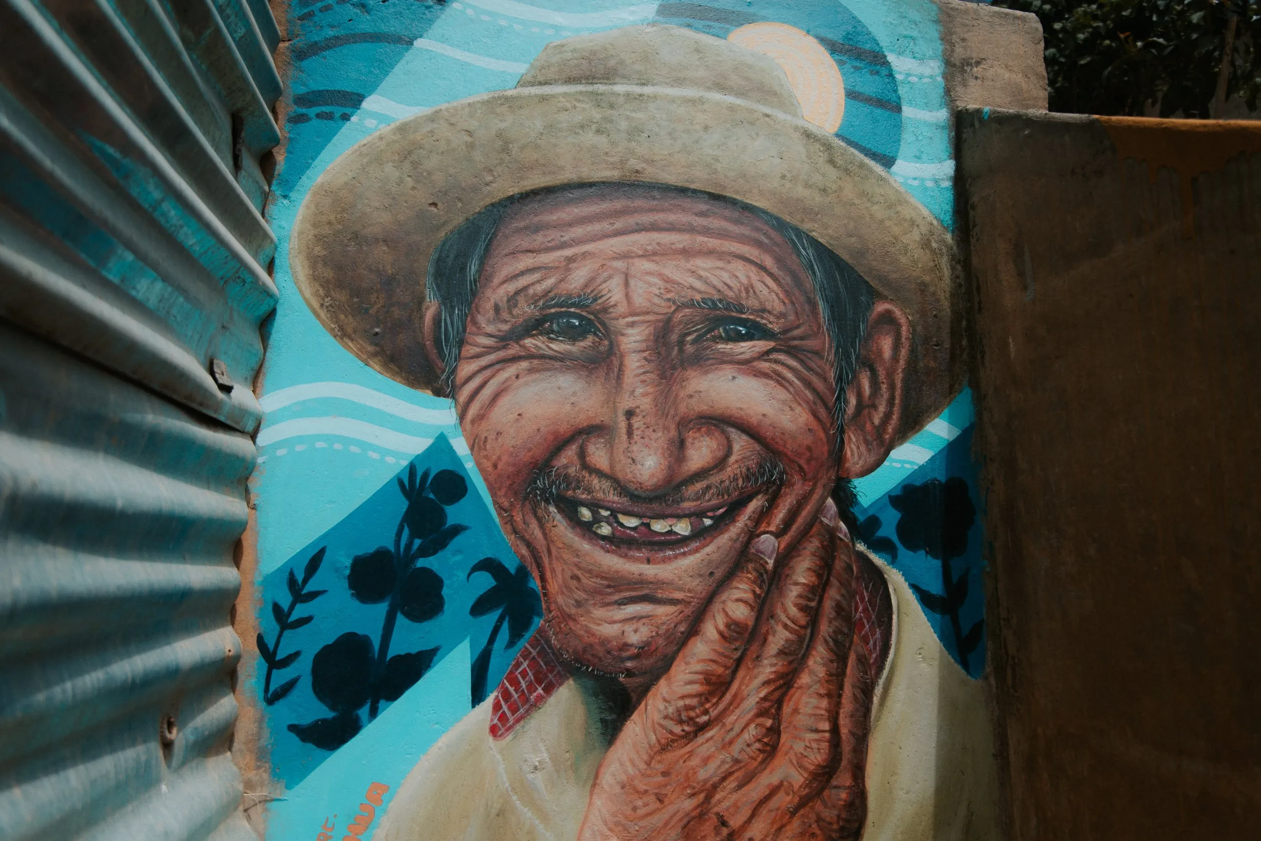 Mural de abuelo campesino en las escalinatas de Shancayán
